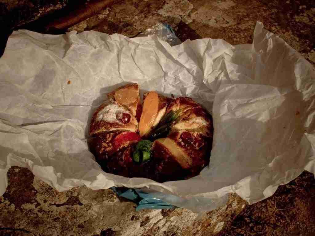 Sliced traditional Portuguese Christmas cake, called Bolo Rei